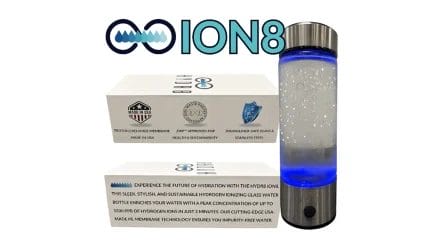 A stainless steel and glass water bottle with blue LED light, displayed with branded boxes featuring hydration and filtration product information and the ION8 logo above.