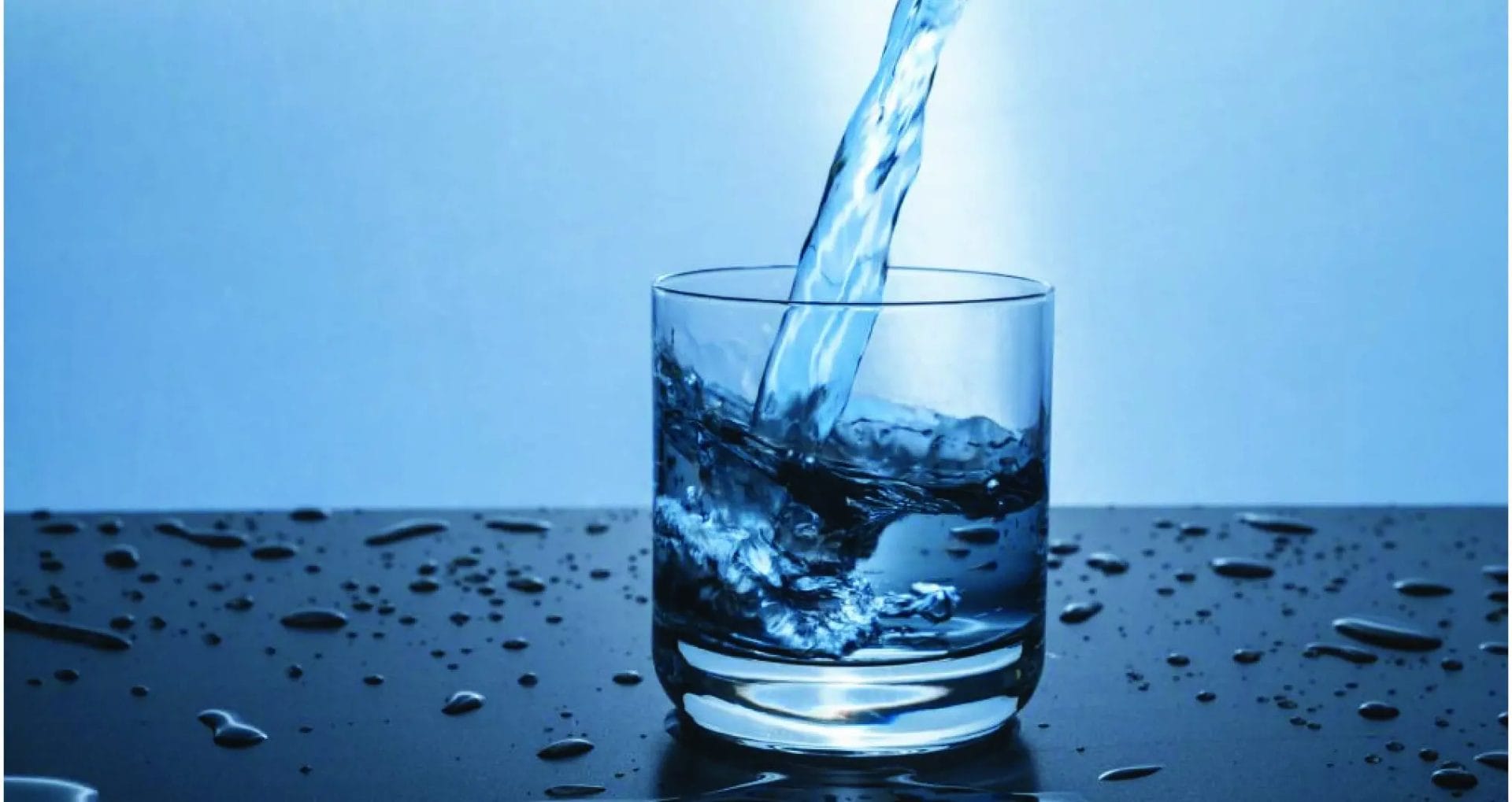 Pouring-a-glass-of-Hydr8-water glass of water getting filled